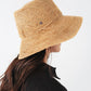 The Raffia Packable Bucket Hat in Natural